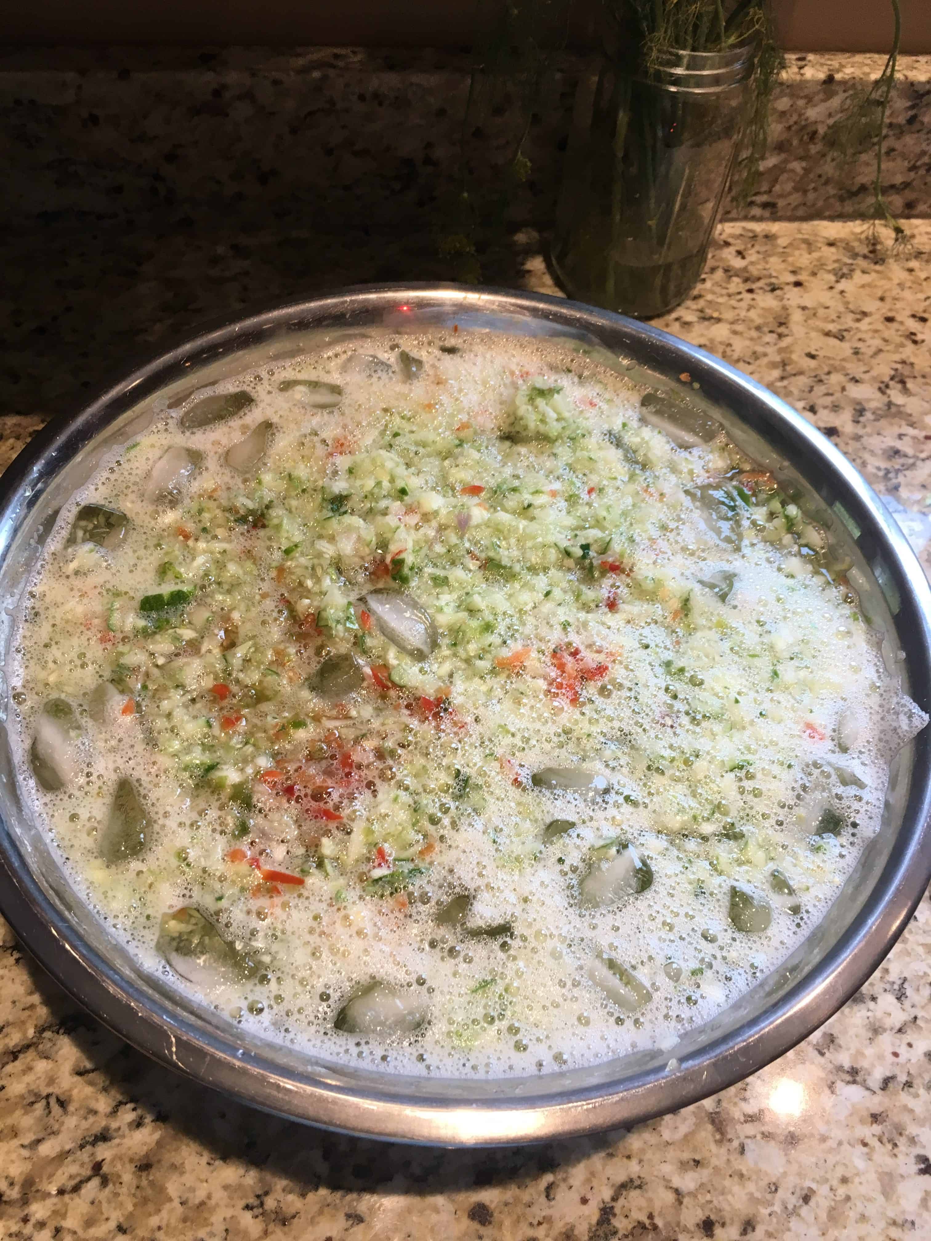 Bowl full of chopped vegetables in salted ice water. https://trimazing.com
