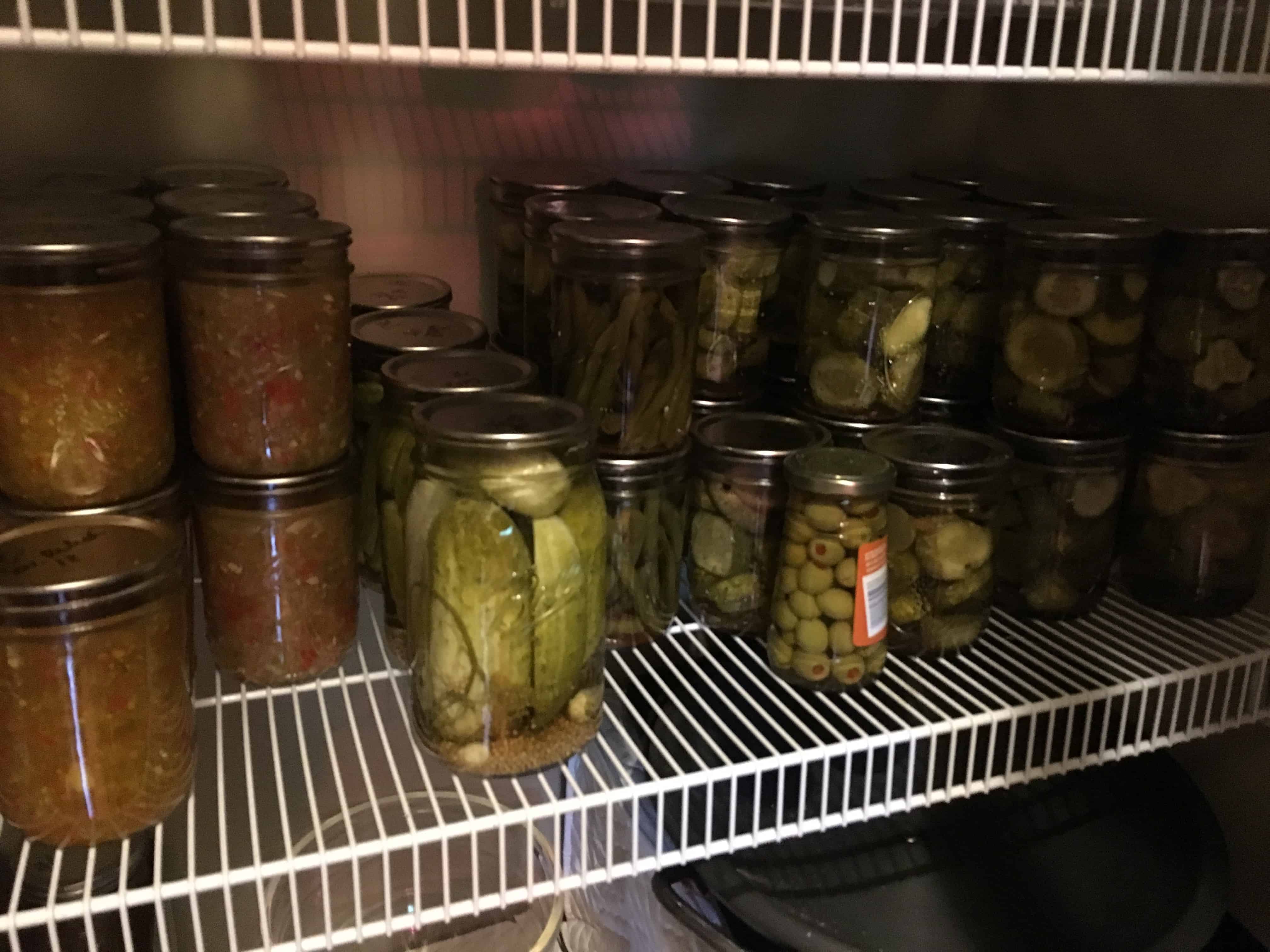 Jars of home canned pickles from zero waste vegan pantry https://trimazing.com
