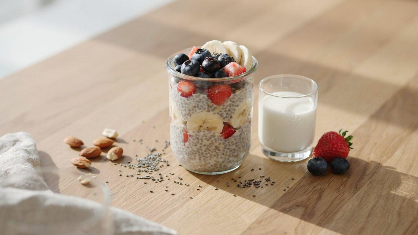 Healthy single-serving chia pudding with fresh fruit, chia seeds, and wholesome ingredients on the breakfast table.
