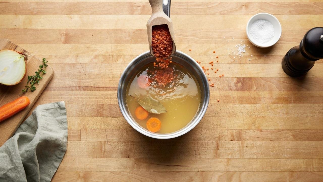 Adding lentils and broth to Misir Wot.