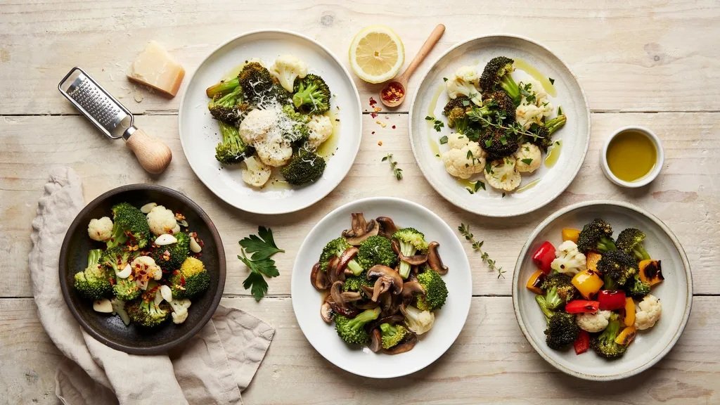 Different variations of sautéed broccoli and cauliflower.