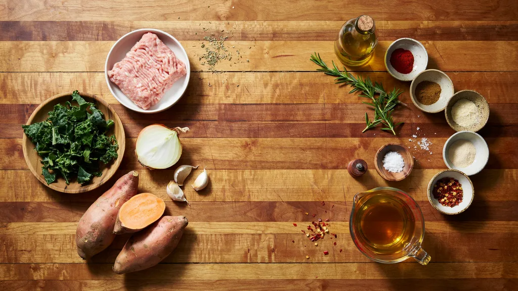 Ingredients for ground turkey and kale recipes arranged on a countertop.