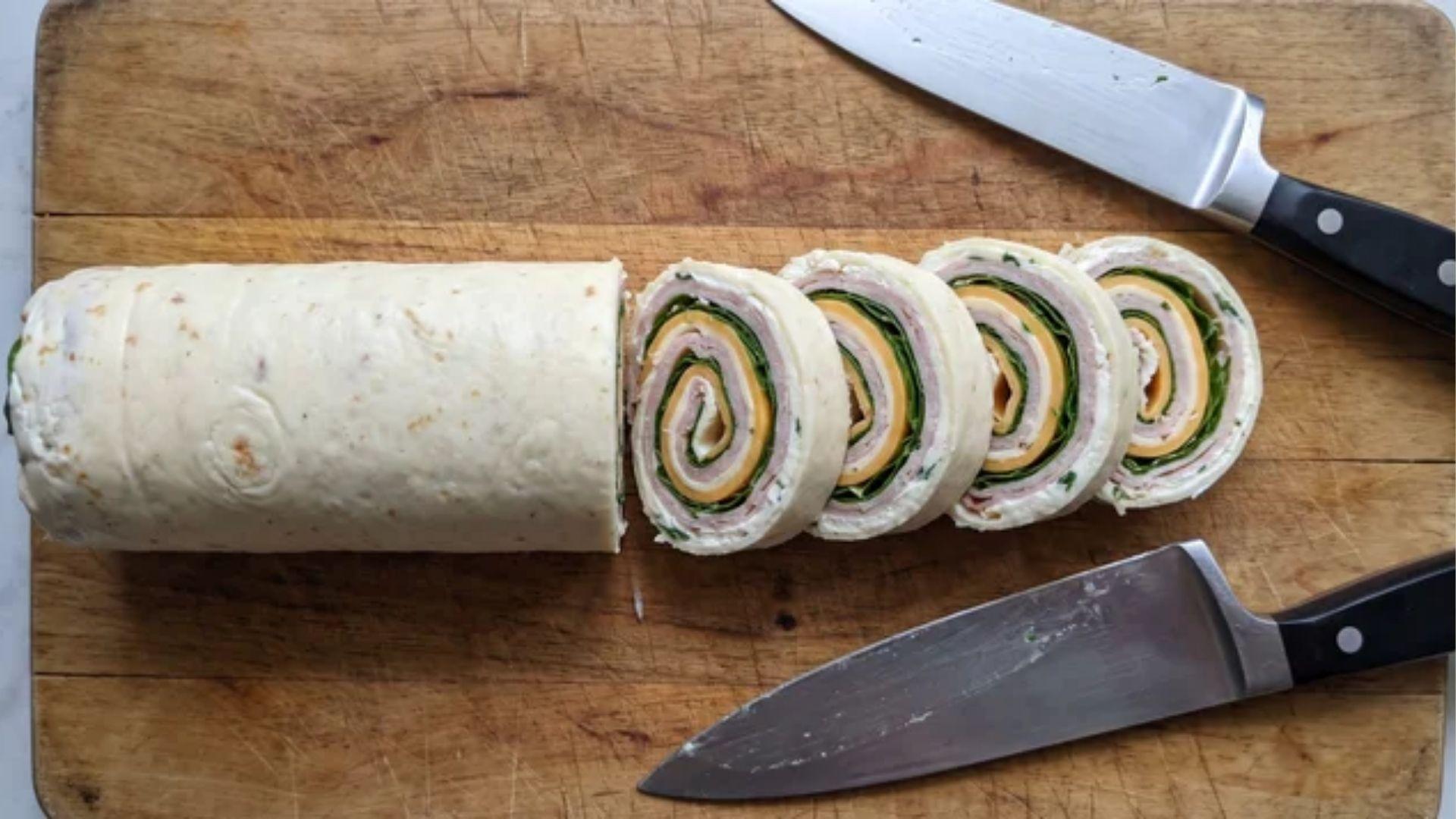 Chilled keto pinwheel roll sliced into one-inch rounds