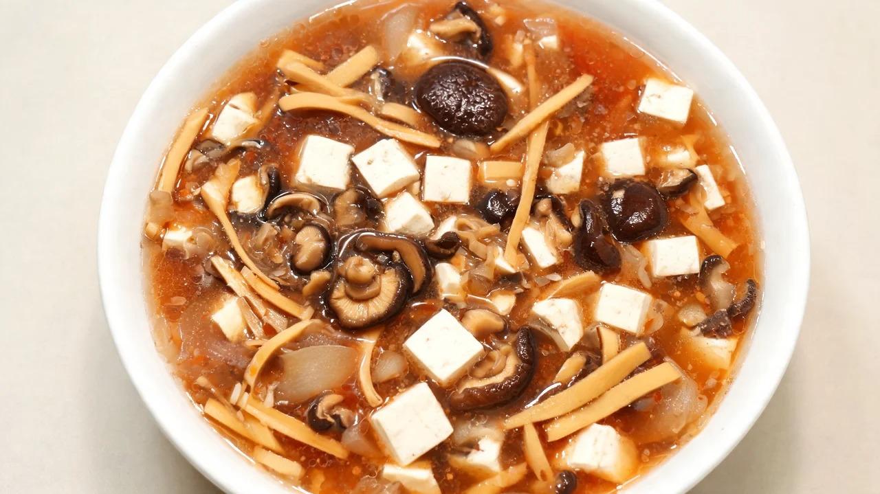 Hot and sour soup with tofu, mushrooms, and bamboo shoots