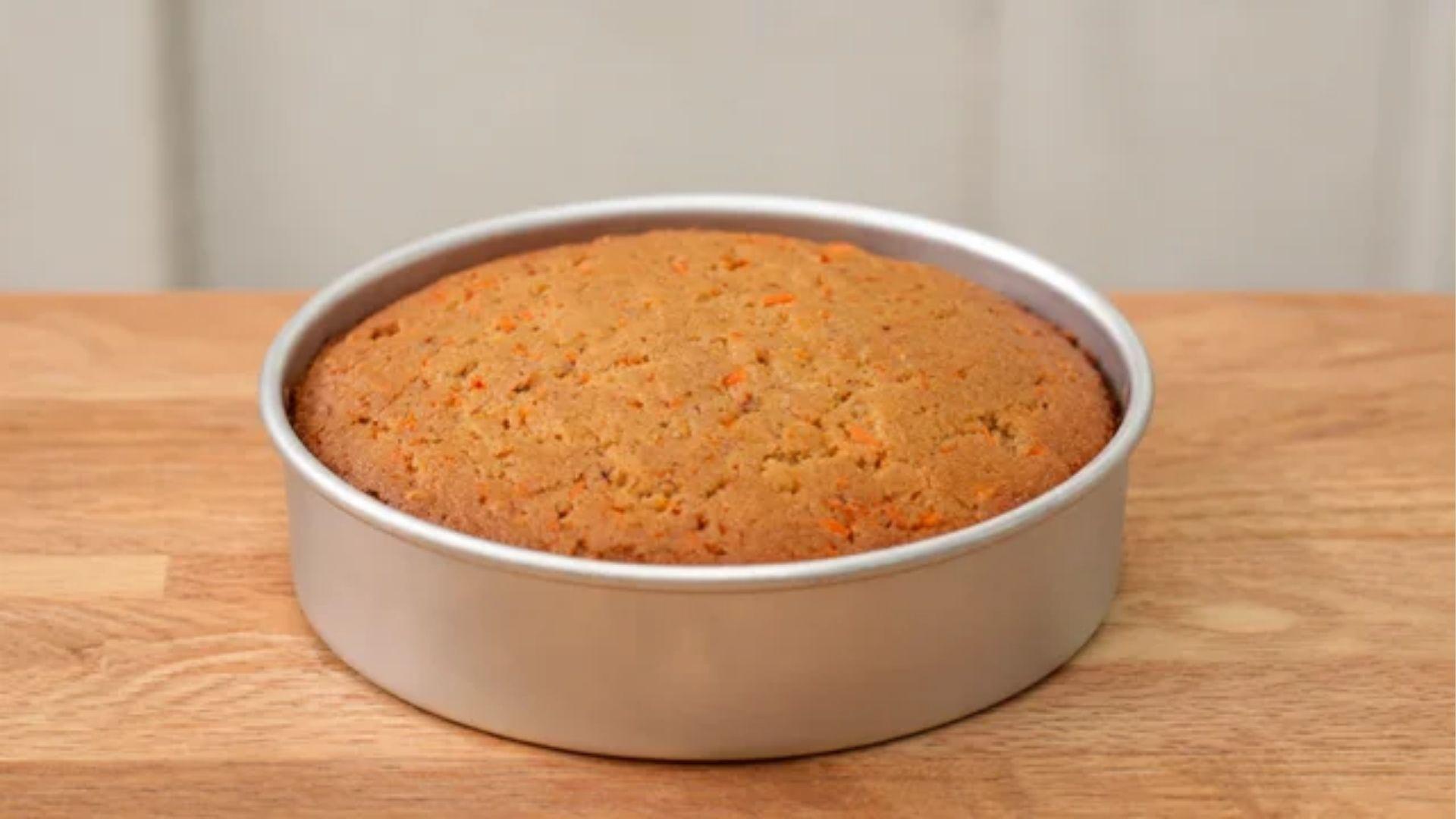Small carrot cake baked in a six-inch round cake pan